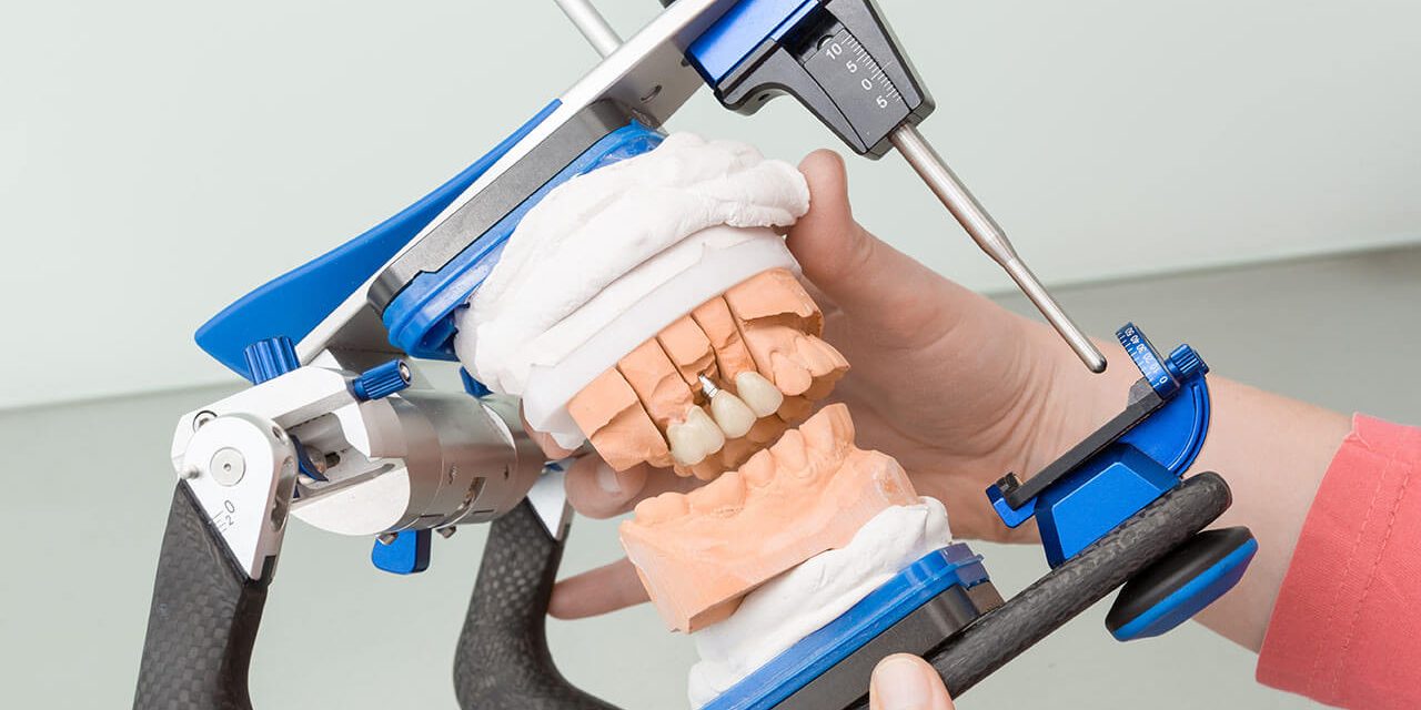 What is an Articulator and how is it used in dentistry?
